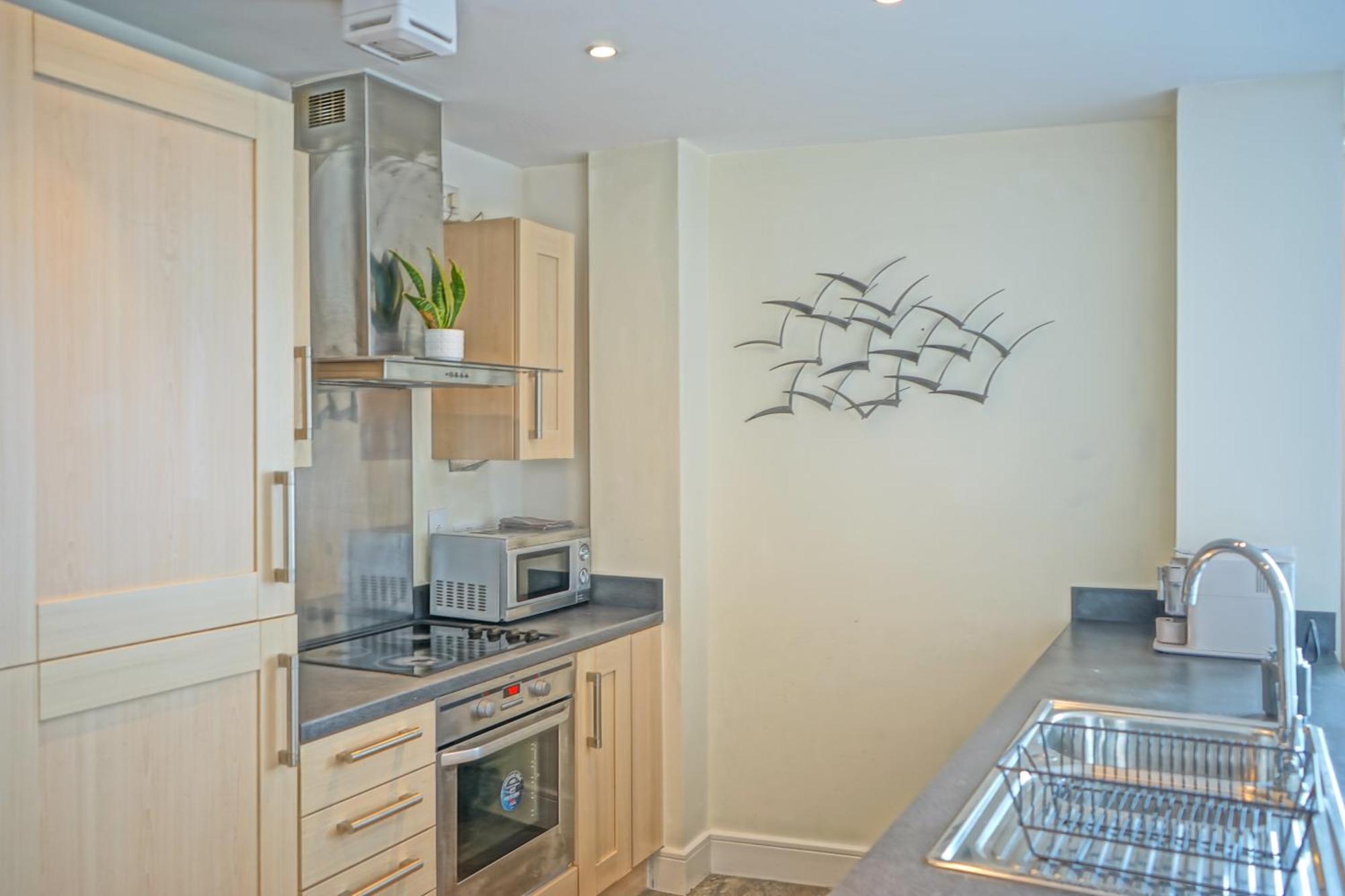 Soak Up The Light At A Soothing, Stylish In Marina Apartment Swansea